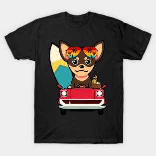 Cute small dog driving to the beach T-Shirt